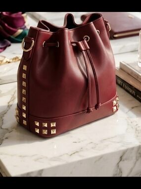 NWT Burgundy Drawstring Bucket Bag with Gold Studs